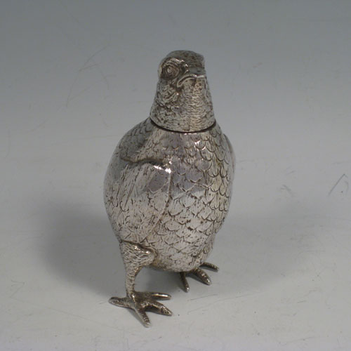 An Antique Victorian Sterling Silver cast model of a bird originally made by Berthold Muller and carrying import marks for London 1897. The dimensions of this fine hand-made antique silver bird model are height 10 cms (4 inches), width 5 cms (2 inches), and it weighs approx. 109g (3.5 troy ounces).