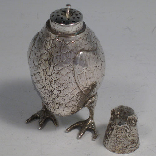 An Antique Victorian Sterling Silver cast model of a bird originally made by Berthold Muller and carrying import marks for London 1897. The dimensions of this fine hand-made antique silver bird model are height 10 cms (4 inches), width 5 cms (2 inches), and it weighs approx. 109g (3.5 troy ounces).