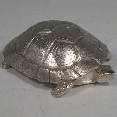    Sterling silver hand-made cast model of a tortoise, hallmarked for London 2008. Length 10 cms (4 inches), width 7.5 cms (3 inches). Weight approx. 9 troy ounces (280g).