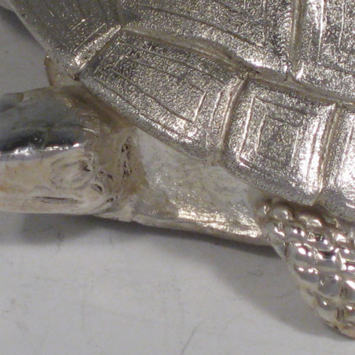    Sterling silver hand-made cast model of a tortoise, hallmarked for London 2008. Length 10 cms (4 inches), width 7.5 cms (3 inches). Weight approx. 9 troy ounces (280g).