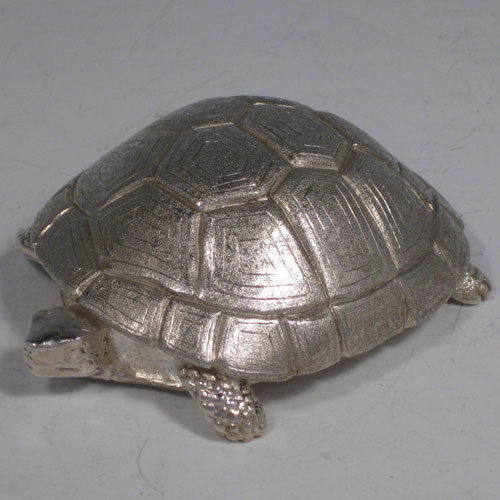    Sterling silver hand-made cast model of a tortoise, hallmarked for London 2008. Length 10 cms (4 inches), width 7.5 cms (3 inches). Weight approx. 9 troy ounces (280g).