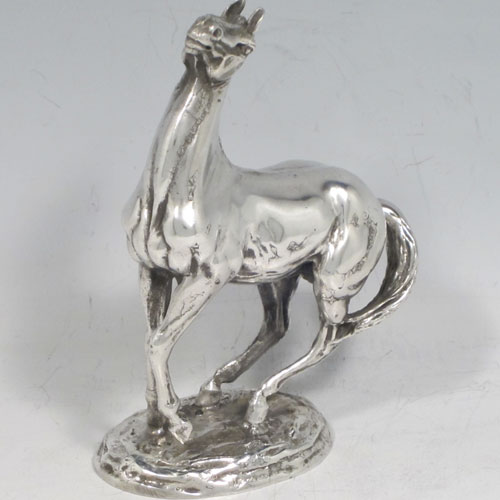 Sterling silver cast model of a horse in original velvet-lined presentation box. A very fine model by the contemporary sculptress Lorne McKean (view her website at www.lornemckean.com). Hallmarked for London in 1975. The dimensions of this hand-made silver horse are height 11 cms (4.5 inches), length 8 cms (3 inches), and it weighs approx. 612g (19.7 troy ounces).