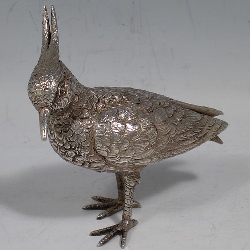 A Continental 800 standard cast Silver model of a lapwing, having realistically hand-chased feathers and body. Made in ca. 1930 having a 800 standard mark. The dimensions of this fine hand-made silver lapwing bird model are height 16.5 cms (6.5 inches), length 8 cms (3 inches), length 8 cms (3 inches), and it weighs approx. 83g (2.7 troy ounces).    