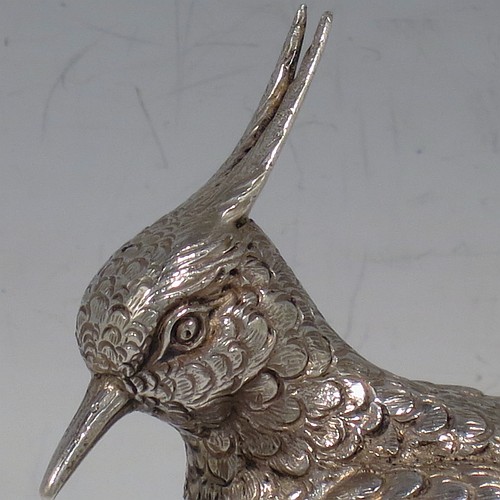 A Continental 800 standard cast Silver model of a lapwing, having realistically hand-chased feathers and body. Made in ca. 1930 having a 800 standard mark. The dimensions of this fine hand-made silver lapwing bird model are height 16.5 cms (6.5 inches), length 8 cms (3 inches), length 8 cms (3 inches), and it weighs approx. 83g (2.7 troy ounces).    