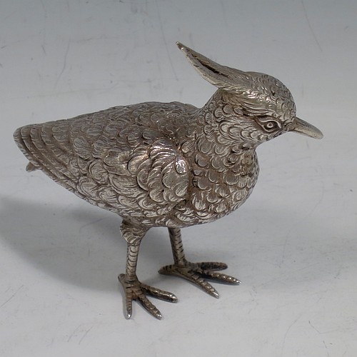 A Continental 800 standard cast Silver model of a lapwing, having realistically hand-chased feathers and body. Made in ca. 1930 having a 800 standard mark. The dimensions of this fine hand-made silver lapwing bird model are height 16.5 cms (6.5 inches), length 8 cms (3 inches), length 8 cms (3 inches), and it weighs approx. 83g (2.7 troy ounces).    