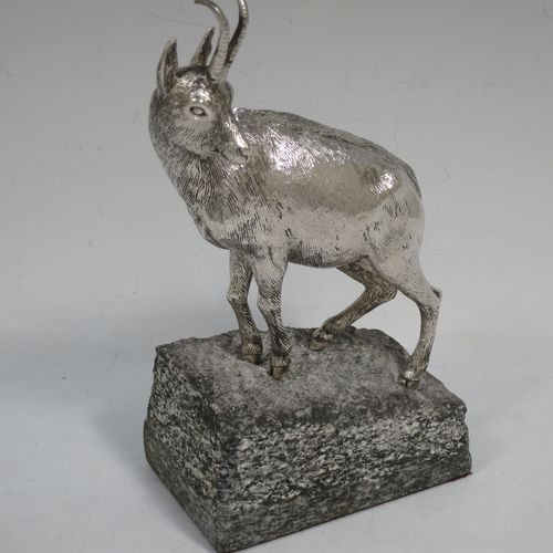 A very handsome Sterling Silver cast model of a goat, realistic handmade large Goat mounted on a piece of grey granite. Made by Holland and Holland of London in ca. 1970. The dimensions of this hand-made silver mountain goat Ibex are height (inc. granite mount) 20 cms (8 inches), and length 13 cms (5 inches).   