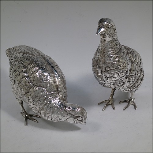 A very handsome and large pair of Antique Edwardian Silver-Plated partridge bird models, having realistically hand-chased feathers, faces, and feet. Made in ca. 1910 in England. The dimensions of this fine hand-made antique silver plated pair of partridge model birds are height 16.5 cms (6.5 inches), length 19 cms (7.5 inches), and width 7.5 cms (3 inches).    