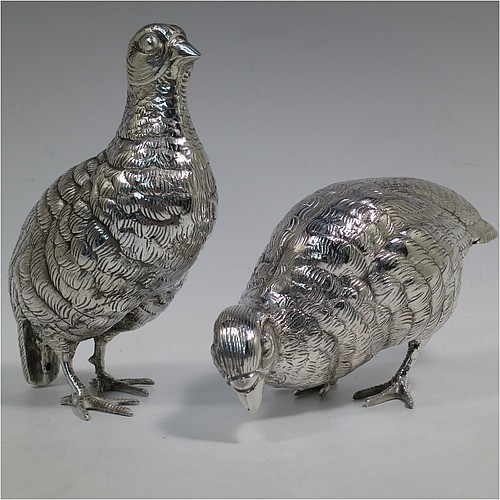 A very handsome and large pair of Antique Edwardian Silver-Plated partridge bird models, having realistically hand-chased feathers, faces, and feet. Made in ca. 1910 in England. The dimensions of this fine hand-made antique silver plated pair of partridge model birds are height 16.5 cms (6.5 inches), length 19 cms (7.5 inches), and width 7.5 cms (3 inches).    