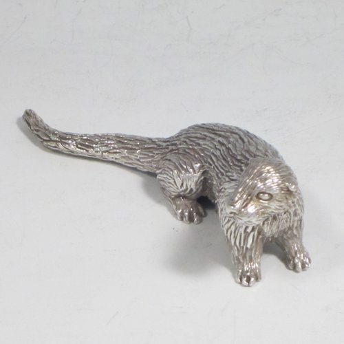 Sterling silver cast model of an otter, having a realistically hand-chased fur body. Made in London in 1993. The dimensions of this fine hand-made silver otter model are length 10 cms (4 inches), height 3.5 cms (1.3 inches), and it weighs approx. 196g (6.3 troy ounces).