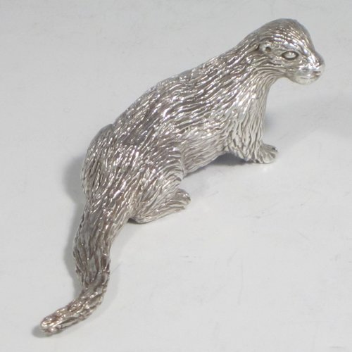 Sterling silver cast model of an otter, having a realistically hand-chased fur body. Made in London in 1993. The dimensions of this fine hand-made silver otter model are length 10 cms (4 inches), height 3.5 cms (1.3 inches), and it weighs approx. 196g (6.3 troy ounces).