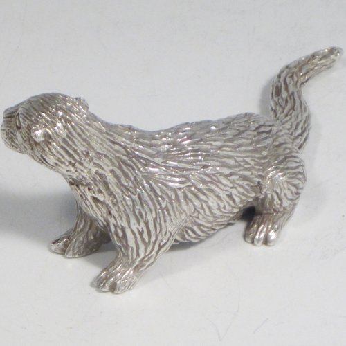 Sterling silver cast model of an otter, having a realistically hand-chased fur body. Made in London in 1993. The dimensions of this fine hand-made silver otter model are length 10 cms (4 inches), height 3.5 cms (1.3 inches), and it weighs approx. 196g (6.3 troy ounces).