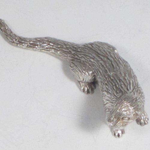 Sterling silver cast model of an otter, having a realistically hand-chased fur body. Made in London in 1993. The dimensions of this fine hand-made silver otter model are length 10 cms (4 inches), height 3.5 cms (1.3 inches), and it weighs approx. 196g (6.3 troy ounces).