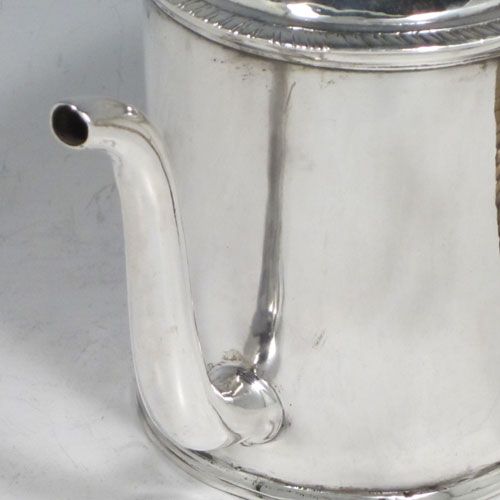 Antique Georgian sterling silver Argyll, having a plain round body with straight sides, a hinged lid with ivory finial, a scroll-shaped spout, a scroll handle with wicker-work insulation, a separate side spout with hinged lid for adding hot water, and sitting on a flat base. Made by Philip Norman of London in 1768. The dimensions of this fine hand-made silver Argyll are height 11.5 cms (4.5 inches), diameter 8 cms (3 inches), and it weighs approx. 390g (12.6 troy ounces).