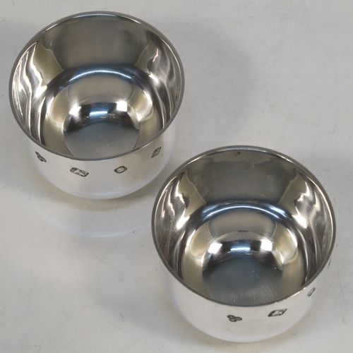 A very handsome and heavy pair of Sterling Silver tumbler cups, having plain round bodies. These beautiful silver tumbler cups were made by Payne and Son of  London in 1983. The dimensions of these fine hand-made silver tumbler cups are height 5 cms (2 inches), diameter 6.5 cms (2.5 inches), and their total weight is approx. 356g (11.5 troy ounces).  