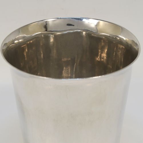 A rare and very handsome Irish Antique Georgian Sterling Silver beaker, having a very plain round body with tapering sides, and sitting on a flat base. This elegant antique Irish silver beaker was made by Clark and West of Dublin in 1808. The dimensions of this fine hand-made antique silver beaker are height 9 cms (3.5 inches), diameter at top 9.5 cms (3.75 inches), and it weighs approx. 180g (5.8 troy ounces).   