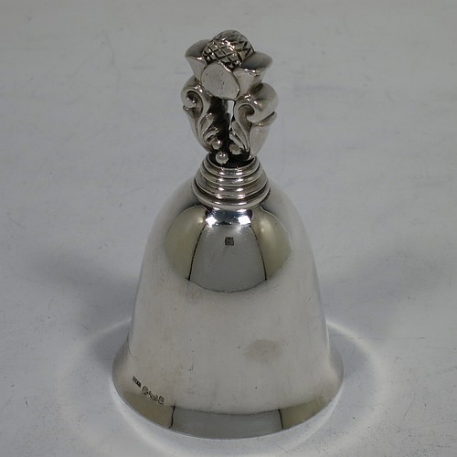 A very pretty Sterling Silver table bell having a plain round body with a cast Acorn pattern handle, and an original silver clapper. Hallmarked for C. J. Vander of London in 1960, and originally designed by Johan Rohde for Georg Jensen. The dimensions of this fine hand-made silver table bell are height 8.5 cms (3.3 inches), diameter at base 5 cms (2 inches), and it weighs approx. 88g (2.8 troy ounces).   