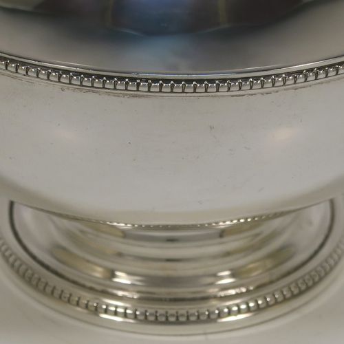 A pretty Antique Victorian Sterling Silver Georgian style small table bowl, having a plain round body, with applied bead-edged borders, and sitting on a pedestal foot. This elegant silver bowl was made in Sheffield in 1868. The dimensions of this fine hand-made antique silver bowl are diameter 10 cms (4 inches), height 6 cms (2.3 inches), and it weighs approx. 96g (3 troy ounces).  