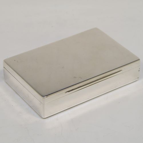 A very elegant Antique Victorian Sterling Silver table box, having a very plain rectangular body, with a hinged lid, a gold-gilt interior, and sitting on a flat base. This handsome silver box was made by William Summers of London in 1882. The dimensions of this fine hand-made antique silver box are length 11 cms (4.3 inches), width 7 cms (2.75 inches), height 2.5 cms (1 inch), and it weighs approx. 197g (6.4 troy ounces).   