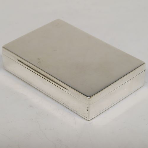 A very elegant Antique Victorian Sterling Silver table box, having a very plain rectangular body, with a hinged lid, a gold-gilt interior, and sitting on a flat base. This handsome silver box was made by William Summers of London in 1882. The dimensions of this fine hand-made antique silver box are length 11 cms (4.3 inches), width 7 cms (2.75 inches), height 2.5 cms (1 inch), and it weighs approx. 197g (6.4 troy ounces).   