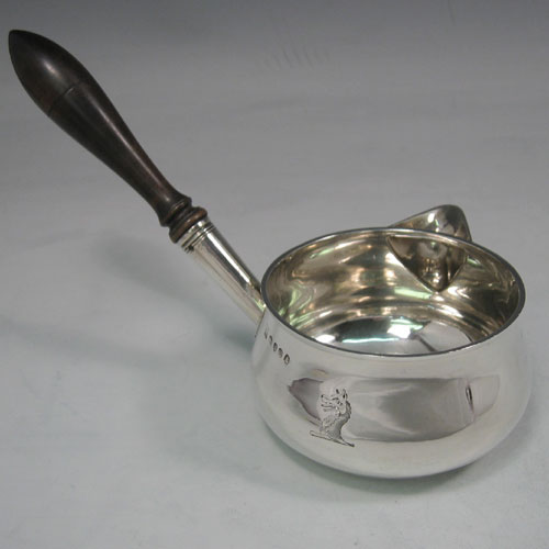    Antique Georgian sterling silver brandy warmer made by Soloman Hougham, S. Royes, & J.E. Dix, of London in 1818. Length 20 cms.