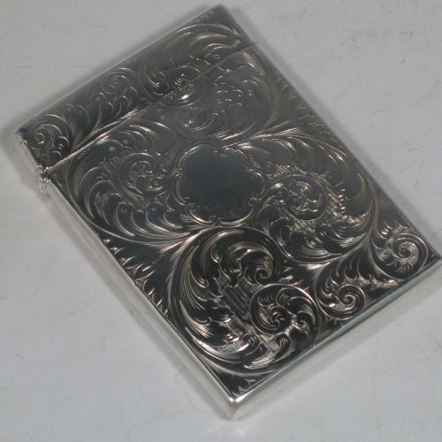 Antique Victorian sterling silver calling card case, having a rectangular body with hand-engraved floral decoration, and a side-hinged lid. Made by Francis Clark of Birmingham in 1847. The dimensions of this fine hand-made silver card case are length 9.5 cms (3.75 inches), width 7 cms (2.75 inches), and it weighs approx. 82g (2.6 troy ounces).   