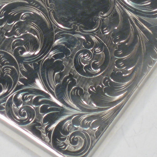 Antique Victorian sterling silver calling card case, having a rectangular body with hand-engraved floral decoration, and a side-hinged lid. Made by Francis Clark of Birmingham in 1847. The dimensions of this fine hand-made silver card case are length 9.5 cms (3.75 inches), width 7 cms (2.75 inches), and it weighs approx. 82g (2.6 troy ounces).   