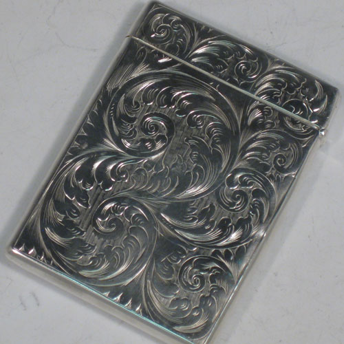 Antique Victorian sterling silver calling card case, having a rectangular body with hand-engraved floral decoration, and a side-hinged lid. Made by Francis Clark of Birmingham in 1847. The dimensions of this fine hand-made silver card case are length 9.5 cms (3.75 inches), width 7 cms (2.75 inches), and it weighs approx. 82g (2.6 troy ounces).   