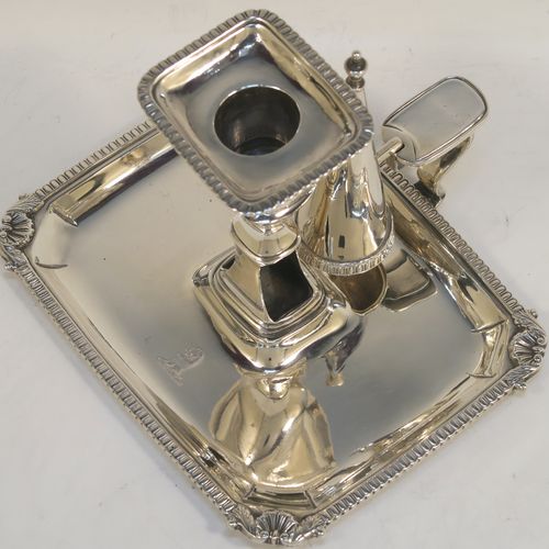 A handsome Antique Georgian Sterling Silver Regency style chamberstick, having a rectangular body with a gadroon & shell border, a side-handle with original removable snuffer, and an original drip-pan nozzle. This elegant antique silver chamberstick was made by Peter and William Bateman of London in 1812. The dimensions of this fine hand-made silver chamberstick are height 11 cms (4.25 inches), length 16 cms (6.25 inches), width 12.5 cms (5 inches), and with a total weight of approx. 352g (11.4 troy ounces). Please note that this item is part crested.