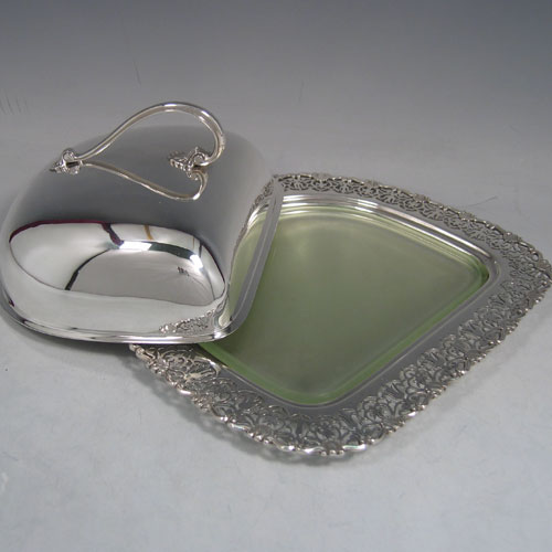 Sterling silver cheese dish, with liner, made by Mappin & Webb Sheffield in 1925. Length 21 cms, height 10 cms.