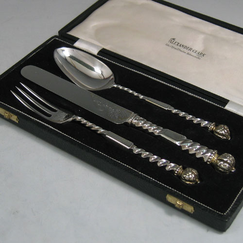 Antique Victorian heavy sterling silver christening set, having a knife, fork, and spoon, all with with cast twisted handles, together with hand-engraved floral decoration, and all sitting in their original satin and velvet-lined presentation box. Made by the most important cutler from the Victorian period, George Adams of London in 1866. The dimensions of this fine hand-made silver christening set are length of knife 20 cms (8 inches), with a total weight of approx. 165g (5.3 troy ounces).