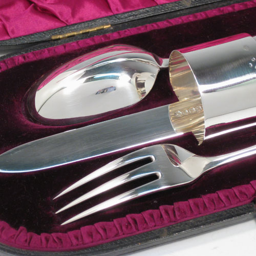 Antique Victorian sterling silver christening set consisting of a plain round napkin ring, and a knife, fork, and spoon in the Rattail Dognose pattern, all in original maroon satin and velvet-lined presentation box. Made by the Barnard Brothers of London in 1890. The dimensions of this fine hand-made silver christening set are length of knife 21 cms (8.25 inches), diameter of napkin ring 4 cms (1.5 inches), and it has a total weight of approx. 166g (5.4 troy ounces).   