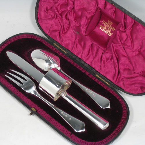 Antique Victorian sterling silver christening set consisting of a plain round napkin ring, and a knife, fork, and spoon in the Rattail Dognose pattern, all in original maroon satin and velvet-lined presentation box. Made by the Barnard Brothers of London in 1890. The dimensions of this fine hand-made silver christening set are length of knife 21 cms (8.25 inches), diameter of napkin ring 4 cms (1.5 inches), and it has a total weight of approx. 166g (5.4 troy ounces).   