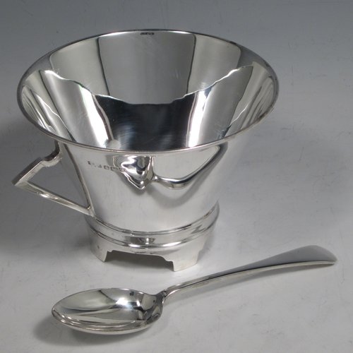 Sterling silver Art Deco christening set consisting of a two-handled bowl and spoon in original blue satin and velvet-lined presentation box. Made by James Dixon & Sons of Sheffield in 1912. The dimensions of this fine hand-made silver christening set are diameter of bowl 10 cms (4 inches), length of spoon 14 cms (5.5 inches), and with a total weight of approx. 187g (6 troy ounces).