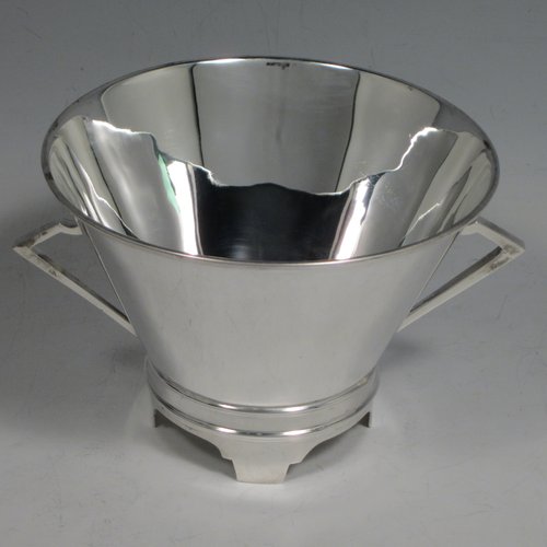 Sterling silver Art Deco christening set consisting of a two-handled bowl and spoon in original blue satin and velvet-lined presentation box. Made by James Dixon & Sons of Sheffield in 1912. The dimensions of this fine hand-made silver christening set are diameter of bowl 10 cms (4 inches), length of spoon 14 cms (5.5 inches), and with a total weight of approx. 187g (6 troy ounces).