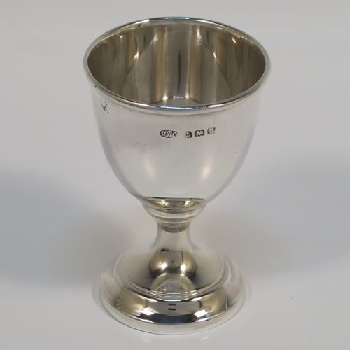 A handsome Sterling Silver three-piece christening set, consisting of a plain round napkin ring, a plain round egg cup, and a plain Old English pattern spoon, all in their original cream satin and black velvet-lined presentation box. This elegant christening set was made by Price and Co.,  of Birmingham in 1933. The dimensions of this fine hand-made silver christening set are length of spoon 11 cms (4.25 inches), diameter of napkin ring 4.5 cms (1.75 inches), and the total weight is approx. 41g (1.3 troy ounces).  