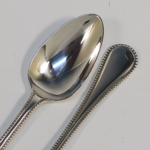 A very pretty Antique Victorian Sterling Silver christening set, having a fork and spoon in the double-struck Bead pattern, and all sitting in their original dark blue satin and velvet-lined presentation box. This beautiful antique silver christening set was made by Henry Holland of London in 1866. The dimensions of this fine hand-made antique silver christening set are length 16 cms (6.3 inches), with a total weight of approx. 68g (2.2 troy ounces)   