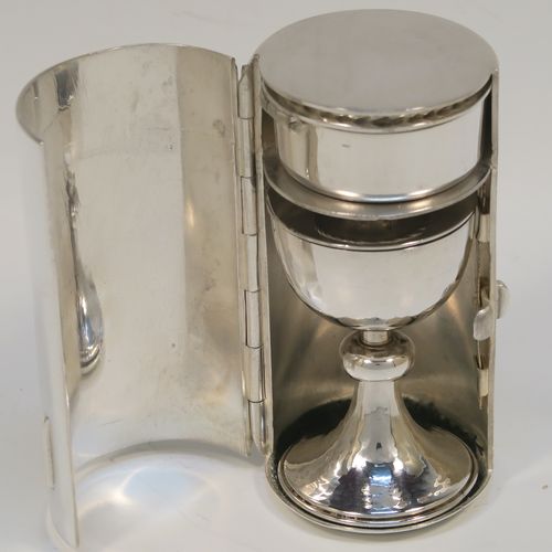 A rare Sterling Silver travelling communion set, consisting of a chalice with pull-off lid and gold-gilt interior, a pyx box with hinged lid, all fitted into a silver-plated cannister style hinged holder with a push-button latch and an applied Christogram on top. This beautiful silver communion set was made by Leonard William Burt of London in 1954. The dimensions of this fine hand-made silver travelling communion set are length of cannister 9 cms (3.5 inches), height of chalice with lid 6.5 cms (2.5 inches), diameter of pyx box 4 cms (1.5 inches), with a total silver weight of approx. 112g (3.6 troy ounces).   