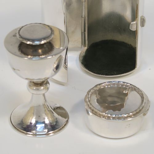 A rare Sterling Silver travelling communion set, consisting of a chalice with pull-off lid and gold-gilt interior, a pyx box with hinged lid, all fitted into a silver-plated cannister style hinged holder with a push-button latch and an applied Christogram on top. This beautiful silver communion set was made by Leonard William Burt of London in 1954. The dimensions of this fine hand-made silver travelling communion set are length of cannister 9 cms (3.5 inches), height of chalice with lid 6.5 cms (2.5 inches), diameter of pyx box 4 cms (1.5 inches), with a total silver weight of approx. 112g (3.6 troy ounces).   