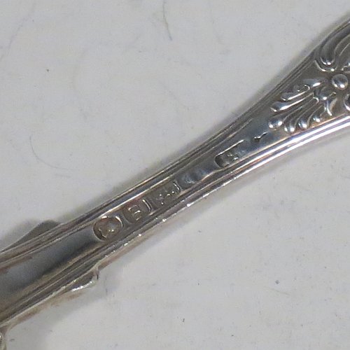 An Antique Georgian Sterling Silver pair of salt spoons, in the double-struck Kings pattern, having gold-gilt bowls. All made by William Traies of London in 1827. The dimensions of these fine hand-made antique silver salt spoons are length 11 cms (4.25 inches), and they weigh a total of approx. 90g (3 troy ounces). Please note that these salt spoons are crested.   