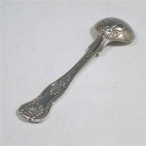 An Antique Georgian Sterling Silver pair of salt spoons, in the double-struck Kings pattern, having gold-gilt bowls. All made by William Traies of London in 1827. The dimensions of these fine hand-made antique silver salt spoons are length 11 cms (4.25 inches), and they weigh a total of approx. 90g (3 troy ounces). Please note that these salt spoons are crested.   