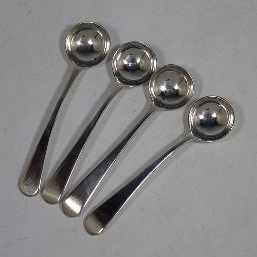 An Antique Georgian Sterling Silver set of four salt spoons, in the Old English pattern. All made by Thomas James of London in 1809. The dimensions of these fine hand-made antique silver salt spoons are length 10 cms (4 inches), and they weigh a total of approx. 37g (1.2 troy ounces).