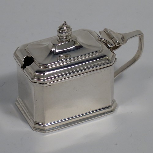 A Sterling Silver Art Deco ten piece condiment service, having octagonal straight-sided bodies, with original blue-glass liners, pull-off lids on the peppers, hinged lids on the mustards, and all in original green velvet and cream satin-lined presentation box. Consisting of two mustard pots, four pepper pots, four salt cellars, and six condiment spoons. Made by Edward and Sons of Birmingham in 1927. The dimensions of this fine hand-made sterling silver condiment service are height of peppers 7 cms (2.75 inches), length of mustard 6.5 cms (2.5 inches), and a total weight of approx. 323g (10.4 troy ounces). Please note that the silver condiment spoons are hallmarked new.