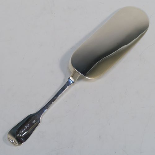 A rare and very elegant Antique Victorian Sterling Silver crumb scoop in the Fiddle pattern, having a very plain blade. This handsome silver crumb scoop was made by the most important Victorian cutlery maker, George Adams of London in 1851. The dimensions of this fine hand-made silver crumb scoop are length 32 cms (12.5 troy ounces), and it weighs approx. 226g (7.3 troy ounces).    