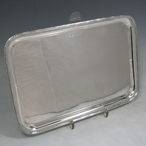    Sterling silver dressing table tray made in Birmingham in 1916. Length 29 cms, width 20 cms.