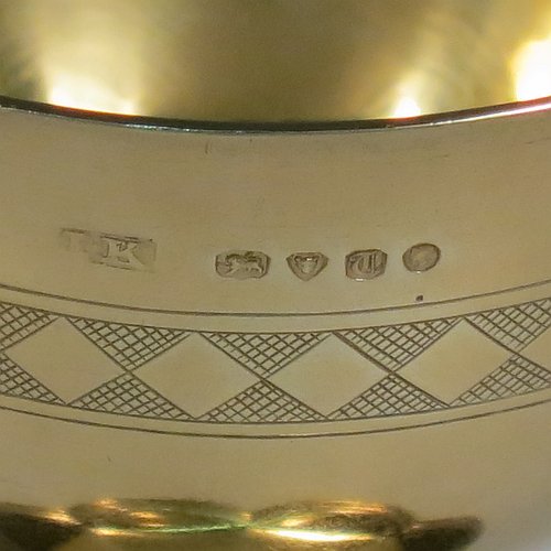 An Antique Victorian Sterling Silver and Gold Gilt small communion chalice, having a round cup with a hand-engraved band of diamond shapes, a middle baluster with hand-chased diamond shaped decoration, and all sitting on a spreading hexafoil foot engraved with a Christogram. Made by John Keith of London in 1855. The dimensions of this fine hand-made antique silver chalice are height 12.5 cms (5 inches), width at base 8 cms (3 inches), and it weighs approx. 125g (4 troy ounces).   