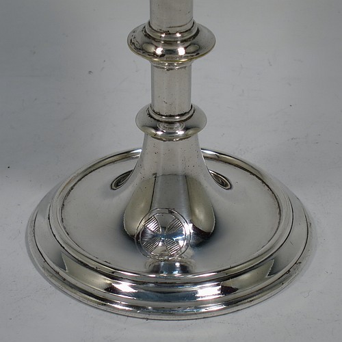 An Antique Edwardian Silver-Plated altar chalice and paten, having a plain round tapering cup with gold-gilt interior, a round column with a middle baluster, and a spreading pedestal foot, together with a plain round original paten. Made by Pratt and Sons of London in circa 1910. The dimensions of this fine hand-made antique silver plated chalice & paten are height 14.5 cms (5.75 inches), and diameter of paten 12.5 cms (5 inches).    