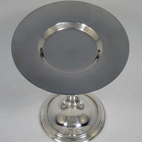 An Antique Edwardian Silver-Plated altar chalice and paten, having a plain round tapering cup with gold-gilt interior, a round column with a middle baluster, and a spreading pedestal foot, together with a plain round original paten. Made by Pratt and Sons of London in circa 1910. The dimensions of this fine hand-made antique silver plated chalice & paten are height 14.5 cms (5.75 inches), and diameter of paten 12.5 cms (5 inches).    