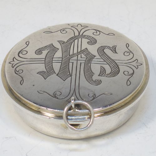 A large and very handsome Sterling Silver Pyx box, having a plain round body, a hinged lid with a hand-engraved Christogram over a cross, a gold-gilt interior, and a clasp with ring handle. Made by Burns, Oats, and Washbourne of London in 1930. The dimensions of this fine hand-made silver Pyx box are diameter 5 cms (2 inches), depth 1.5 cms (0.5 inches), and it weighs approx. 33g (1 troy ounce).   