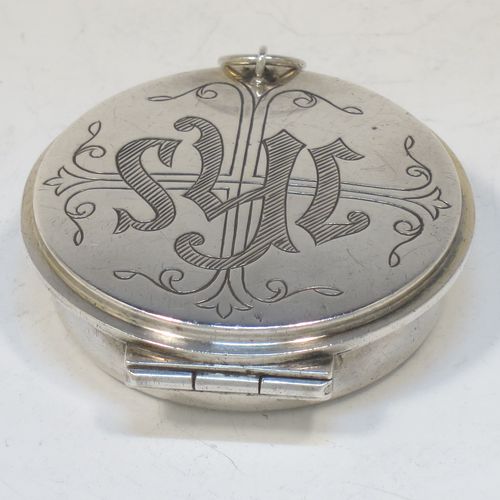 A large and very handsome Sterling Silver Pyx box, having a plain round body, a hinged lid with a hand-engraved Christogram over a cross, a gold-gilt interior, and a clasp with ring handle. Made by Burns, Oats, and Washbourne of London in 1930. The dimensions of this fine hand-made silver Pyx box are diameter 5 cms (2 inches), depth 1.5 cms (0.5 inches), and it weighs approx. 33g (1 troy ounce).   