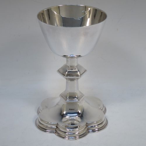 A very handsome Antique Edwardian Sterling Silver altar chalice, having a plain round bellied cup, a hexagonal column with middle baluster, and a lobed spreading hexafoil foot with double reeded border. Made by Horace Woodward and Co., of London in 1907. The dimensions of this fine hand-made antique silver altar chalice are height 16.5 cms (6.5 inches), diameter of cup 9 cms (3.5 inches), diameter at base 11.5 cms (4.5 inches), and it weighs approx. 349g (11.3 troy ounces).   